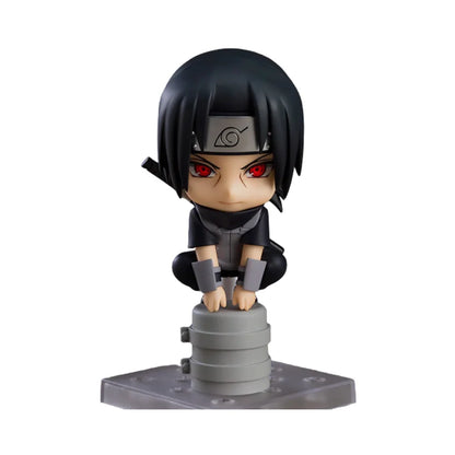 Ninja chibi action figure with black hair, red eyes, gray-and-black ANBU outfit, on base