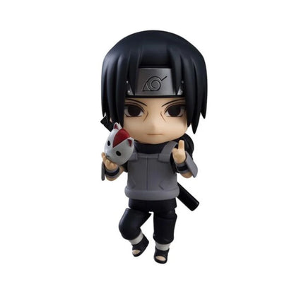 Ninja chibi action figure holding a small white and red fox-like mascot, gray-and-black suit