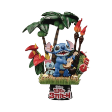 Stitch figure with palm tree and torch accessories on grass-covered base