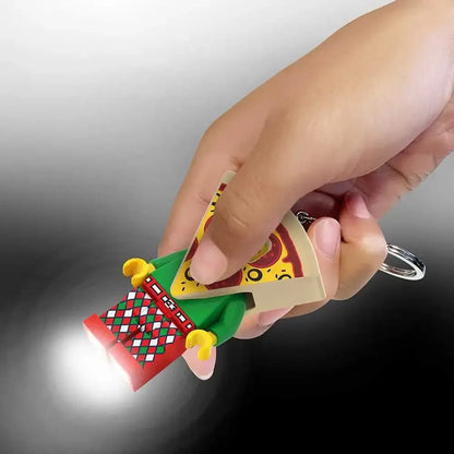 Pizza guy keychain figure in hand with glowing LED light and metal key ring