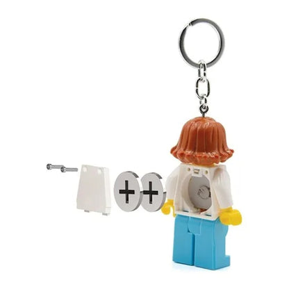 Female doctor keychain with cross sign, white lab coat, brown hair, metal key ring
