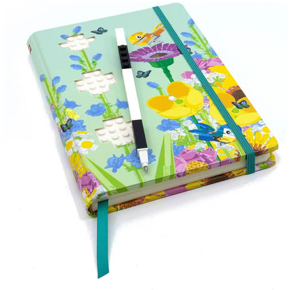 Botanicals notebook with gel pen, open pages with flowers, leaves and butterflies