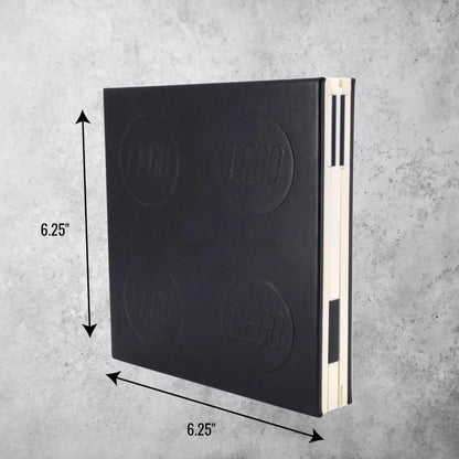 Black locking notebook with embossed circular pattern on front cover