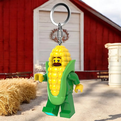 LED corn cob guy key chain with yellow corn figure, green outfit, metal key ring