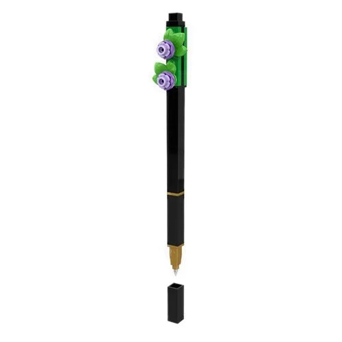 Gel pen with black barrel, green cap, and purple flower decorative charm