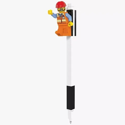 Gel pen with minifigure topper, black grip and clear tip, upright view