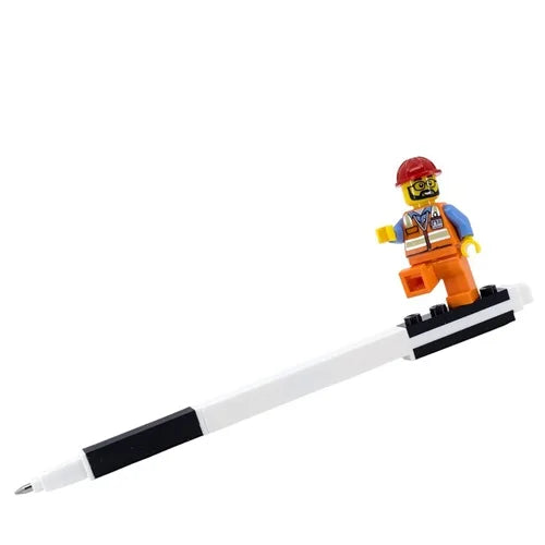 Gel pen with minifigure topper, black grip and white barrel, angled view