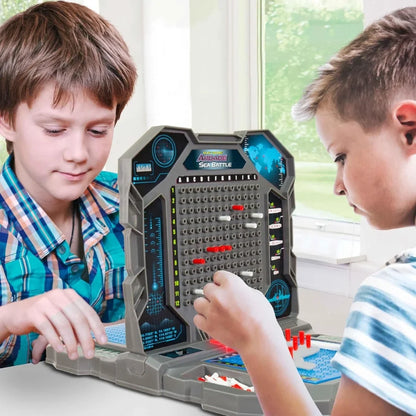 Children playing electronic sea battle arcade game, pointing at the peg board and controls