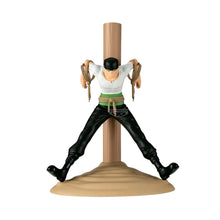 Pirate Hunter Zoro action figure by Banpresto on tan base, white top and black pants