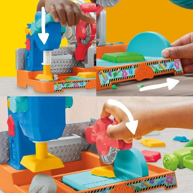 Toy dough stamping bench with hands pressing red stamp; colorful dough on teal tray