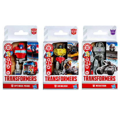 Assorted Transformers blister packs: Optimus Prime, Grimlock, Megatron (6+).