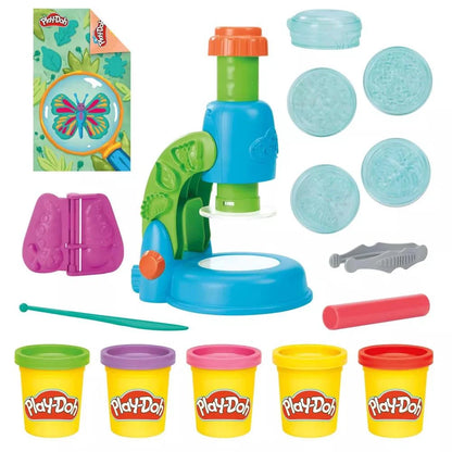 Blue light scope toy with purple mold, tools, and Play-Doh color cups