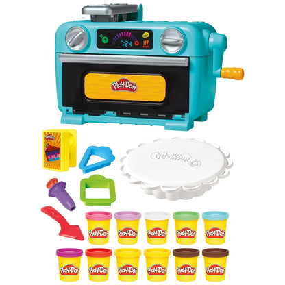 Play-Doh cake dough playset close-up: teal oven, white cake base, dough tubs & tools