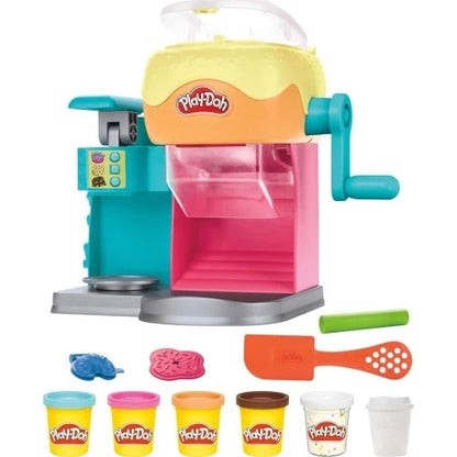 Play-Doh donut drop playset with teal machine, pink tray, molds and colorful dough pots