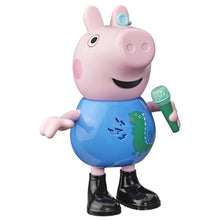 George Pig figure with pink head, blue belly graphic, black boots, holding green accessory