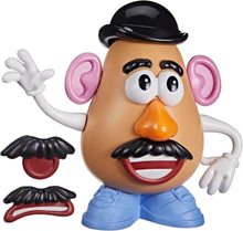 Mr Potato Head toy figure with black hat, orange nose, blue shorts, arms raised
