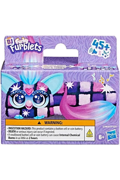 DJ Furblet collectible toy in purple blister packaging, blue cat-like face with big eyes