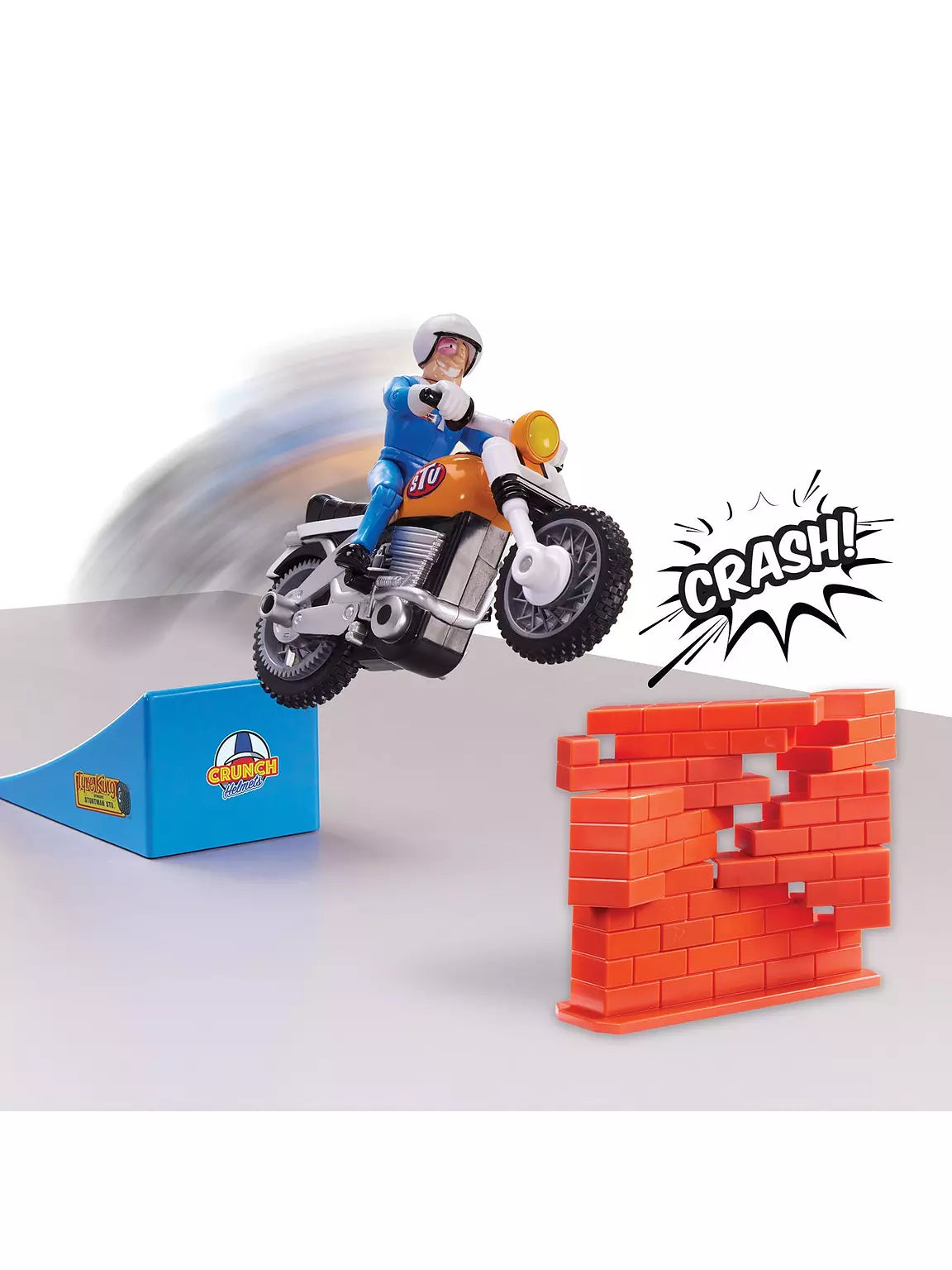 Nitro Boost Stunt Bike with rider mid-jump, blue ramp and red brick wall