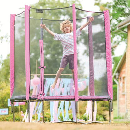 Pink safety-net trampoline with padded mat and metal frame, net enclosure