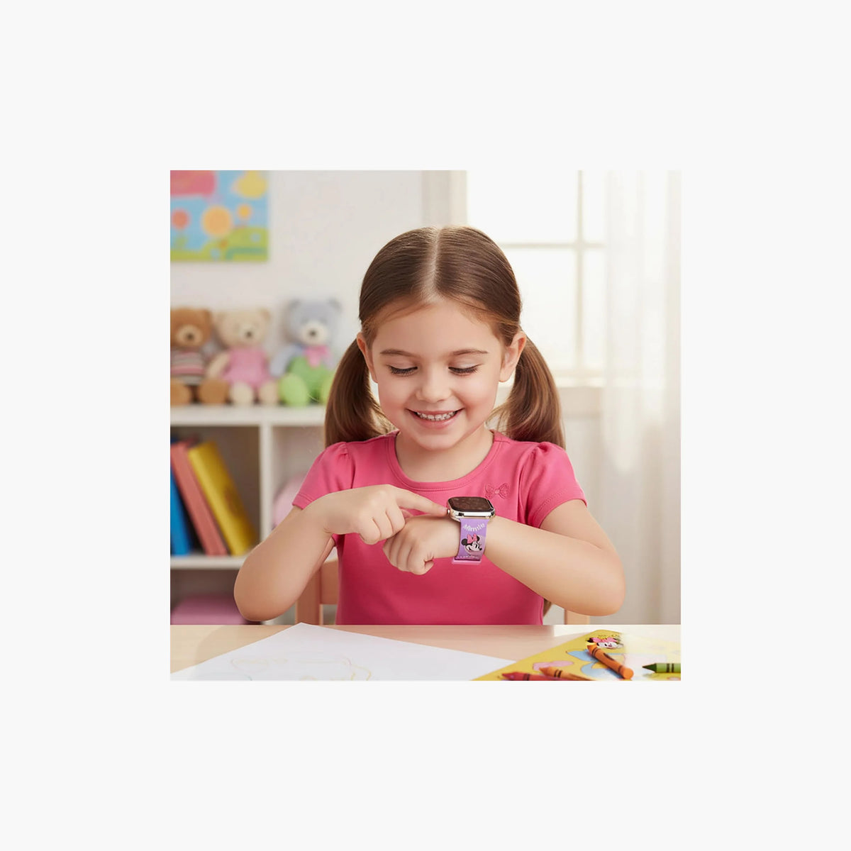 Pink Minnie Mouse digital watch on child’s wrist, black display window