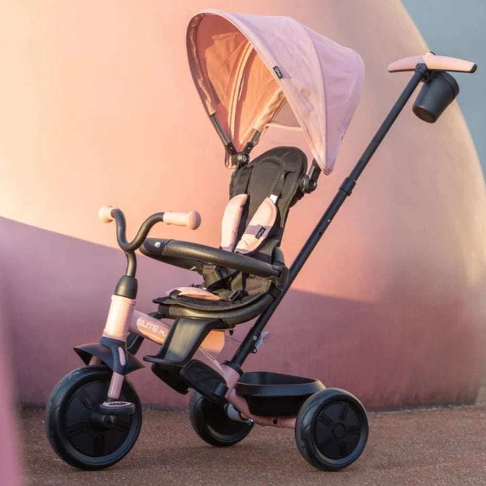 Pink/black 3-wheel tricycle stroller with open canopy and large side wheels