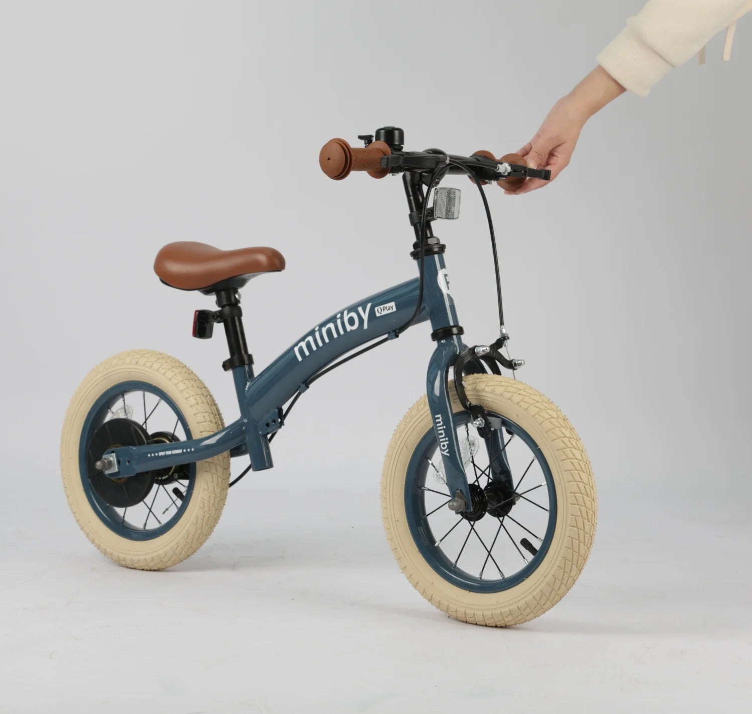 Gray-blue 3in1 miniby balance bike with tan seat and handlebar grips