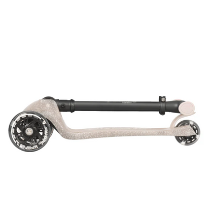 Nude sparkling kids scooter with three wheels and pink padded handlebar grips