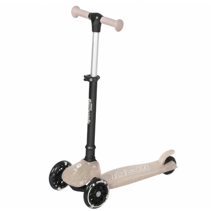 Nude sparkling kids scooter with three wheels and beige handlebar grips
