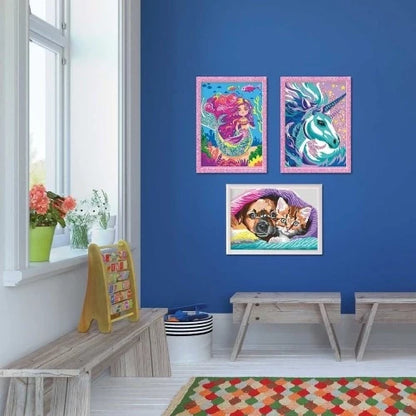 Set of three framed mermaid paint-by-numbers pictures displayed on a wall