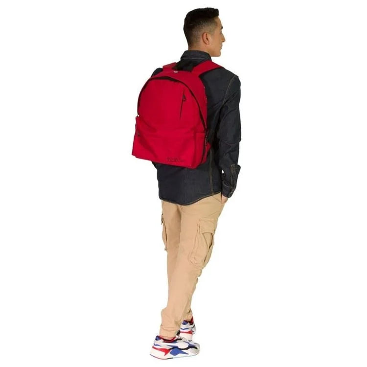 Red backpack worn by a man, black back panel and padded shoulder straps