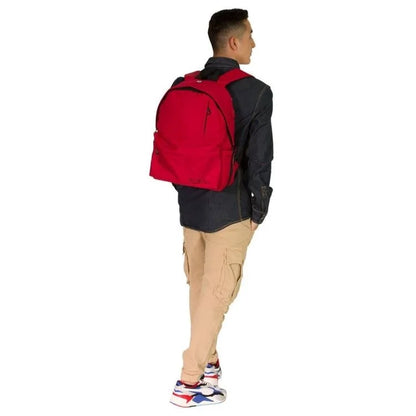 Red backpack worn by a man, black back panel and padded shoulder straps