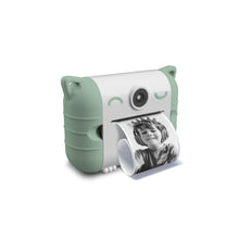 Green and white thermal print camera with cat-ear side grips and a printed photo display