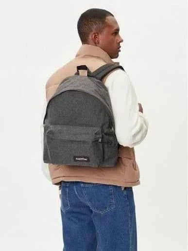 Eastpak padded backpack, gray with black top handle and side panel detail