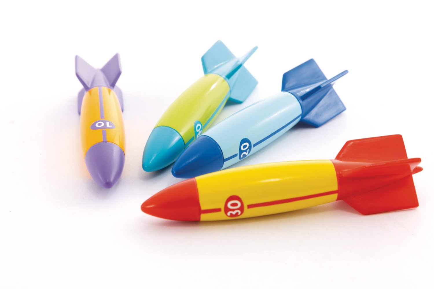 Underwater torpedo toy rockets in red, yellow, blue, and purple with fin tips