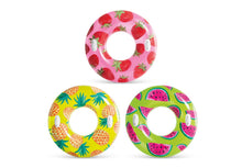 Assorted tropical fruit swim tube floats with pineapple and watermelon patterns, pink green yellow