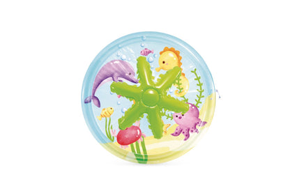 Inflatable pool top view with blue rim and sea-animal graphics