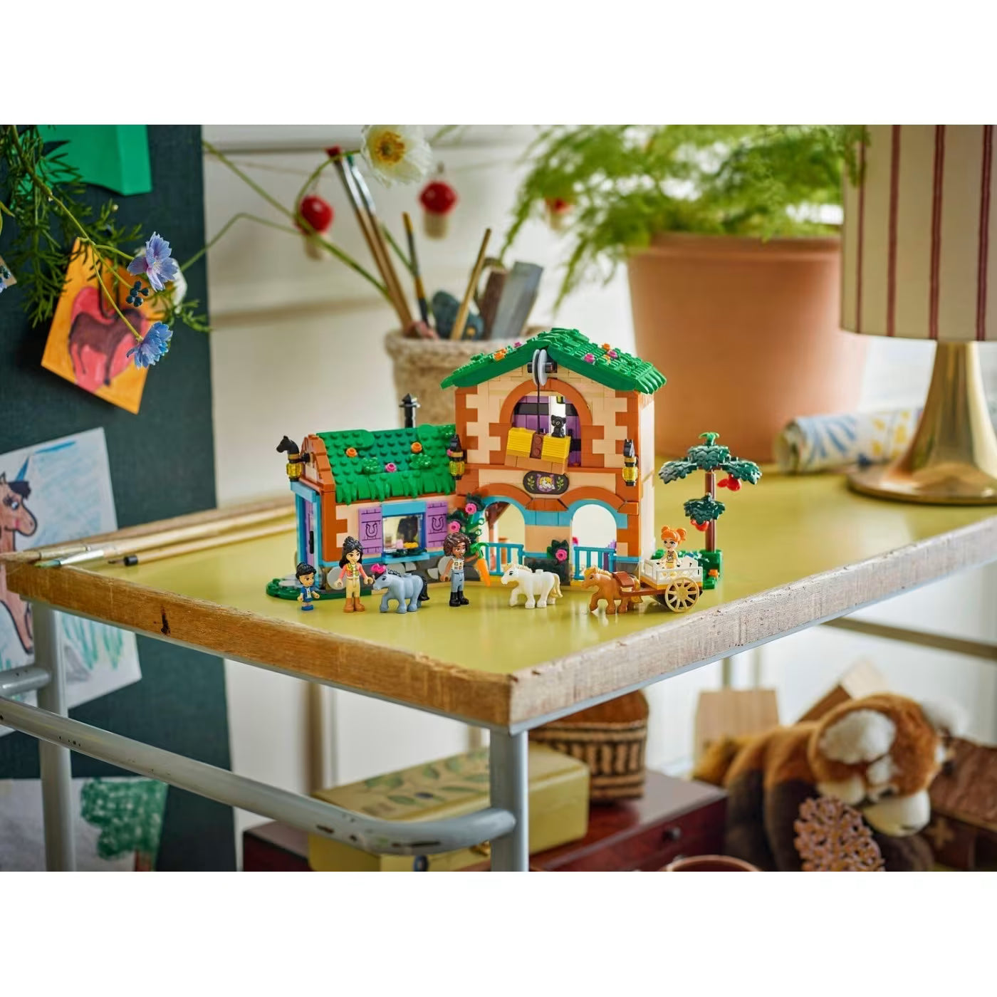 Pony Ranch & Stable model playset on table with horses and minifigures