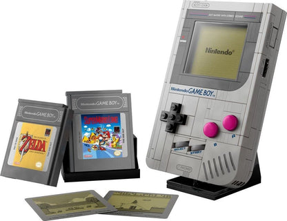 LEGO Game Boy handheld model with pink buttons, plus two cartridge pieces