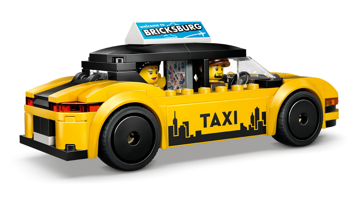 Yellow taxi toy car with BRICKSBURG roof sign, side view with two interior figures