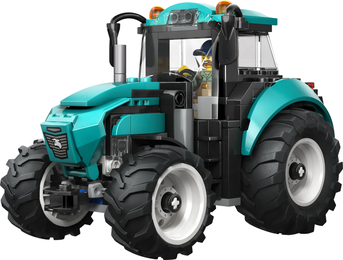 Teal and black tractor toy with large tread wheels and front loader