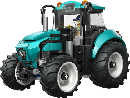 Teal and black tractor toy with large tread wheels and front loader