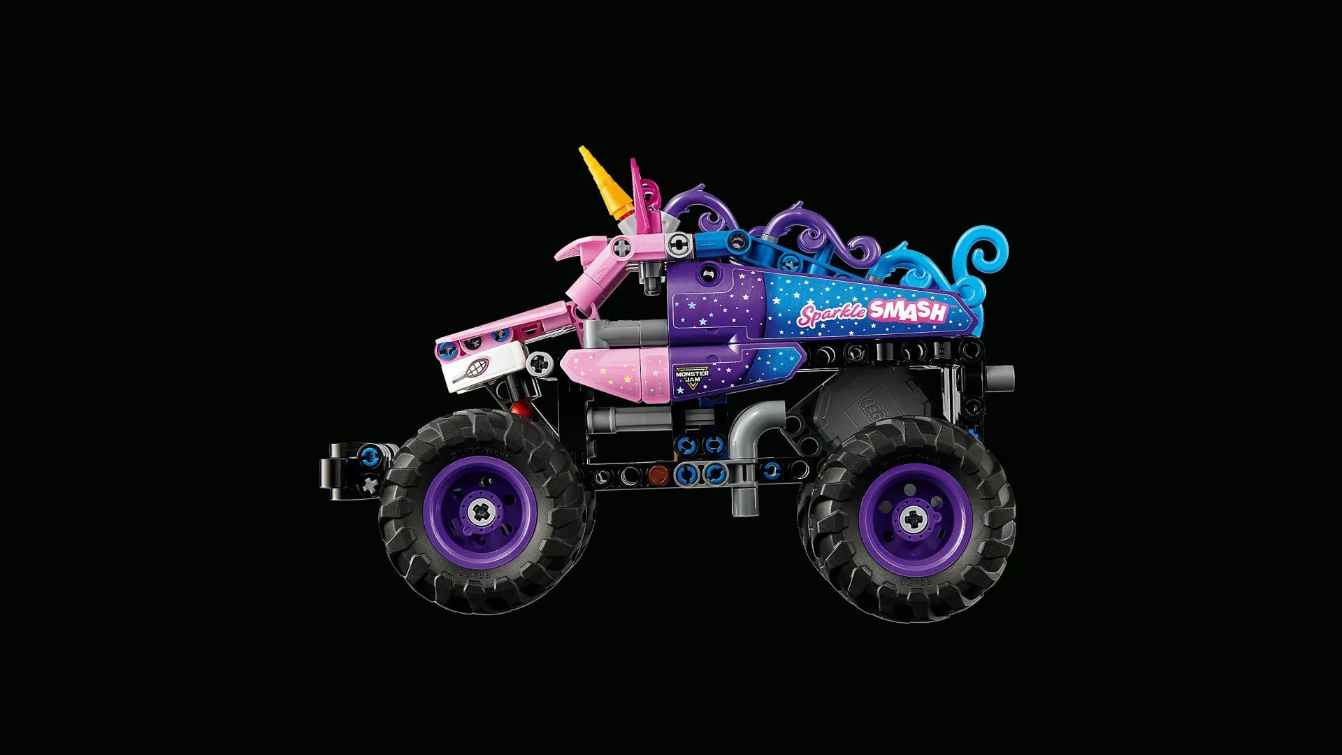 Pink and purple sparkle pull-back monster truck toy with oversized tread wheels