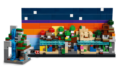 Mini Biomes Modell mit blauem Dach, orangem Hintergrund und grünen Deko-Elementen vorn