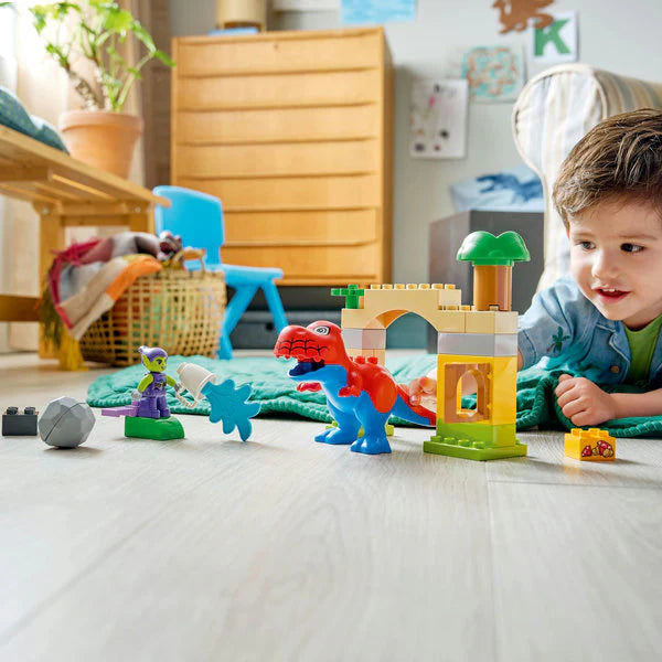Dinosaur Spidey-Rex vs Green Goblin playset pieces and figures on a play surface