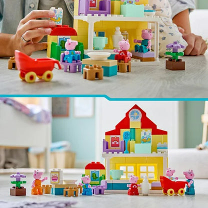 Peppa Pig Family House playset on table with small cars, blocks, and characters