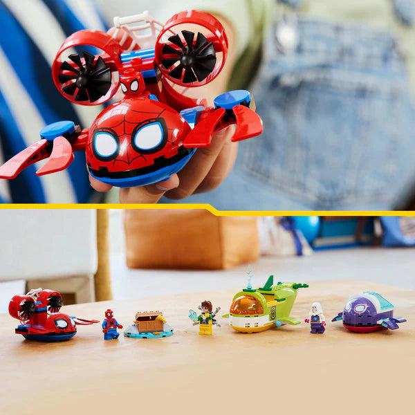 Close-up red Spidey submersible with mini figures and purple/green vehicles