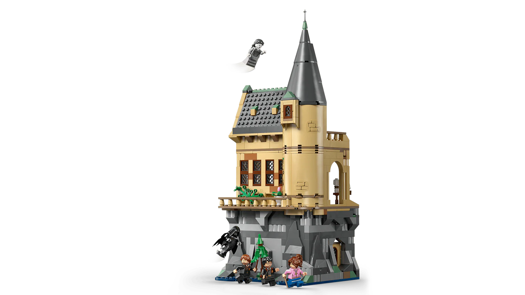 Hogwarts Hospital Wing castle model from side with tall spire and minifigures