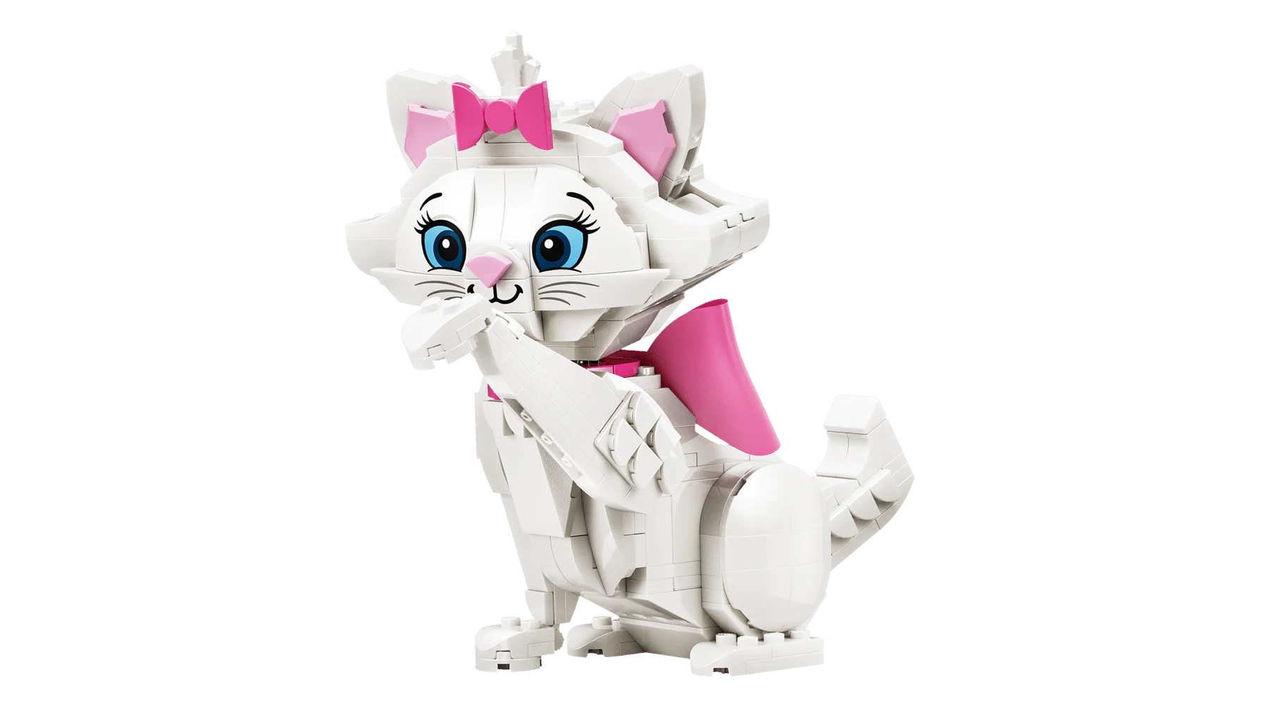 White Marie cat building figure with pink bow and blue eyes, standing with one paw raised