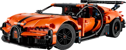 Orange hypercar model with front grille, big tires, and black roll-cage detail.