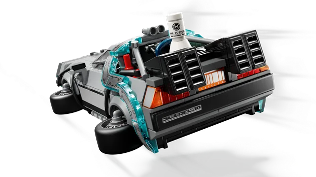 Time machine toy vehicle, teal frame and orange lights, angled side view